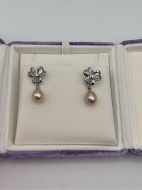 Silver Plated  Bow Drop Earrings with Peach Pearl Dangles